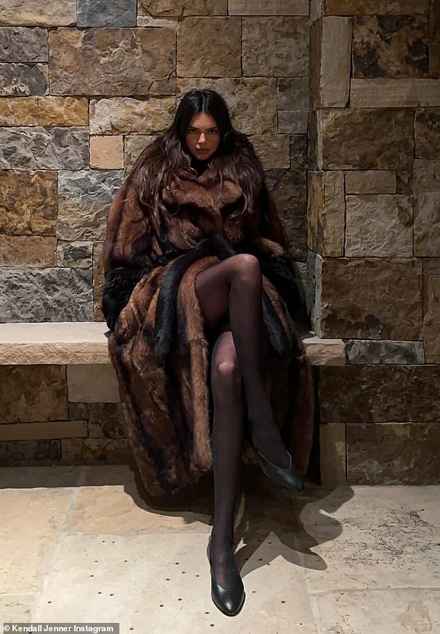 Kendall Jenner, 28, has been slammed by fans for wearing a real shearling fur coat in recent Instagram snaps from Aspen, Colorado