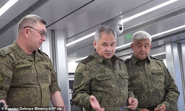 Russian Defence Minister Sergei Shoigu is seen meeting troops on Russian state TV