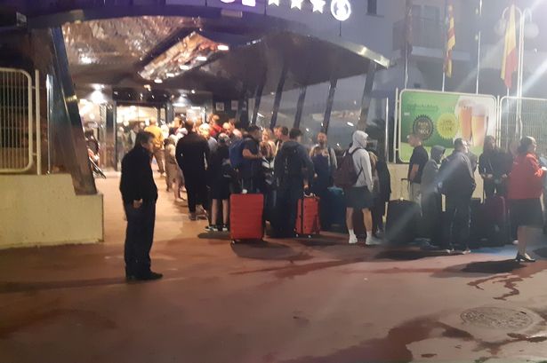 Manchester families forced to queue for hotel on Benidorm strip for HOURS after flight chaos