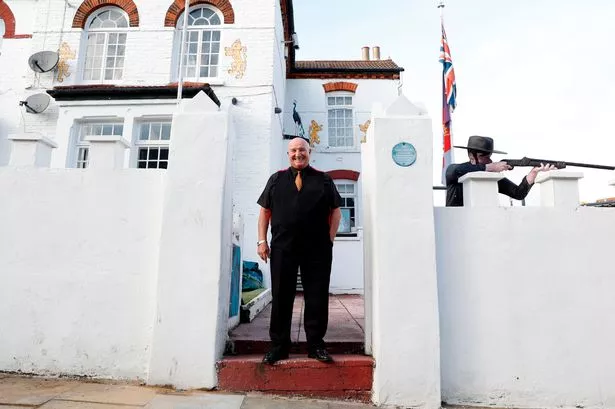 Dave Courtney's foul-mouthed message to Google Earth on roof of his house