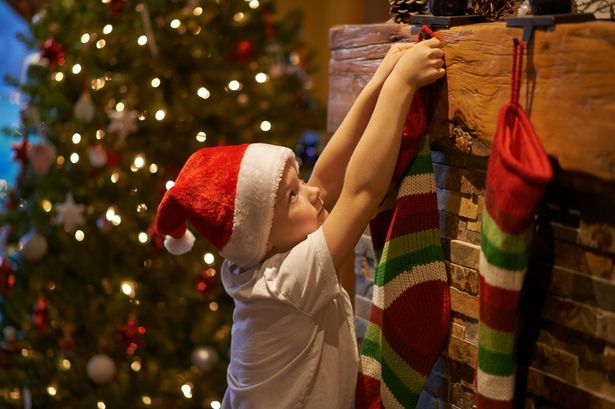 Woman shares genius method for creating a Christmas stocking out of an old jumper Woman shares genius method for creating a Christmas stocking out of an old jumper