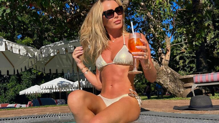 Amanda Holden shows off incredible abs as she sips cocktail in silver bikini by the pool Amanda Holden shows off incredible abs as she sips cocktail in silver bikini by the pool