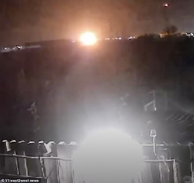 Moment Ukrainian kamikaze drone hits massive oil refinery in Volgograd in first airstrike on Russian city since Hitler 81 years ago