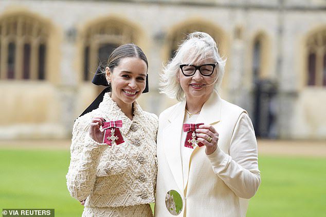 Games of Thrones star Emilia Clarke is joined by her mother as she’s given gong by Prince William at Windsor Castle for setting up brain injury charity – as Spoons boss Tim Martin and Sajid Javid are knighted