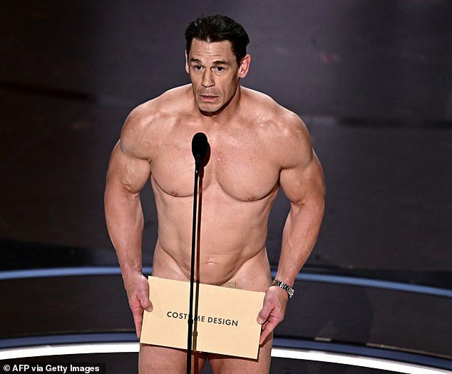 John Cena wasn’t nearly as naked as he appeared when presenting the Best Costume Design award at the Oscars