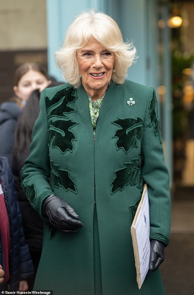 Queen Camilla, pictured during a visit to Northern Ireland, said Charles was 'doing very well'