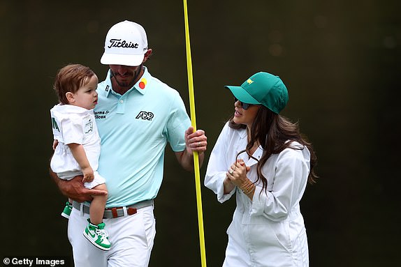AUGUSTA, GEORGIA - APRIL 10: Max Homa of the United States with his wife Lacey and son Camduring the Par Three Contest prior to the 2024 Masters Tournament at Augusta National Golf Club on April 10, 2024 in Augusta, Georgia. (Photo by Maddie Meyer/Getty Images)