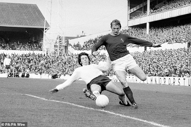 Tottenham Hotspur's Kinnear (left) and Burnley's Steve Kindon battle for the ball in 1970